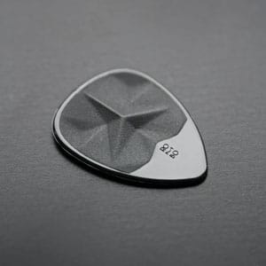 High-quality guitar pick with ergonomic design and durable material for optimal playing experience. Perfect for guitarists seeking precision and comfort.